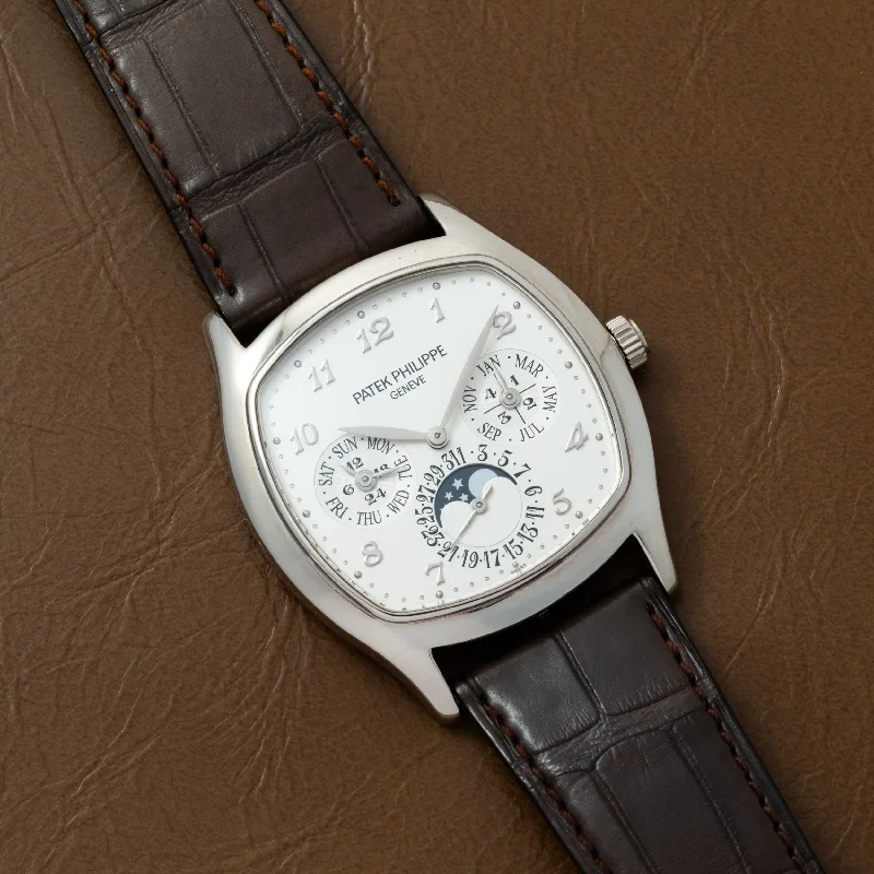 Watches with leather straps and quick release clasps   Patek Philippe Tonneau Perpetual Calendar